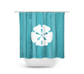 A shower curtain featuring a central white sand dollar design against a teal colored background of wood planks.