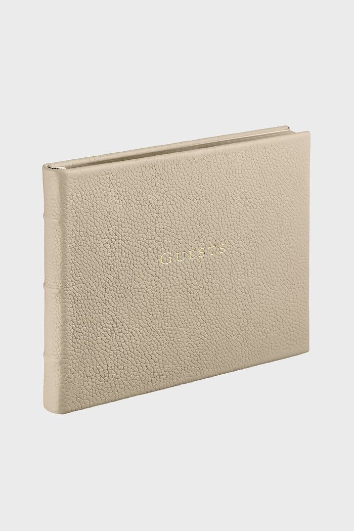Beechwood Pebble Grain Guest Book with GUESTS embossed in gold offers a classic, high-end touch for events, featuring durable leather and effortless elegance.
