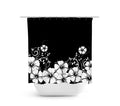 A black and white floral shower curtain with a vine design, displayed on a curtain rod over a white bathtub. The background is black. The flowers and vines are white.