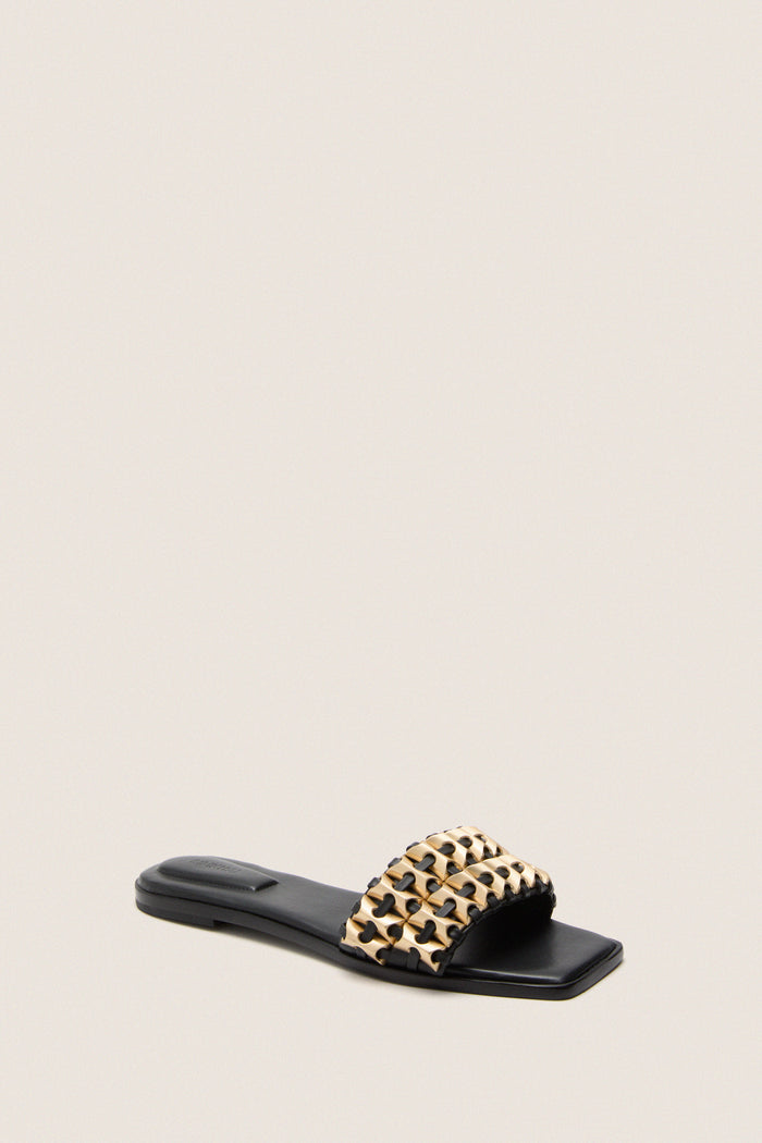Black Faye Beaded Leather Flat Slides featuring a classic slip-on design with gold-tone woven strap, embodying effortless elegance and high-end style for a fun, versatile look.