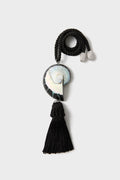 Black Nautilus Necklace: A classic, high-end accessory featuring a twisted black rope with silver-tone caps, iridescent spiral shell pendant, and an effortless black tassel, perfect for fun occasions.