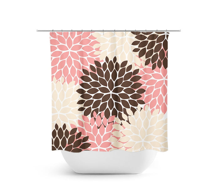 Shower curtain with modern design of flower bursts in blush pink, brown, and tan colors with a white background barely peeking through the flowers.