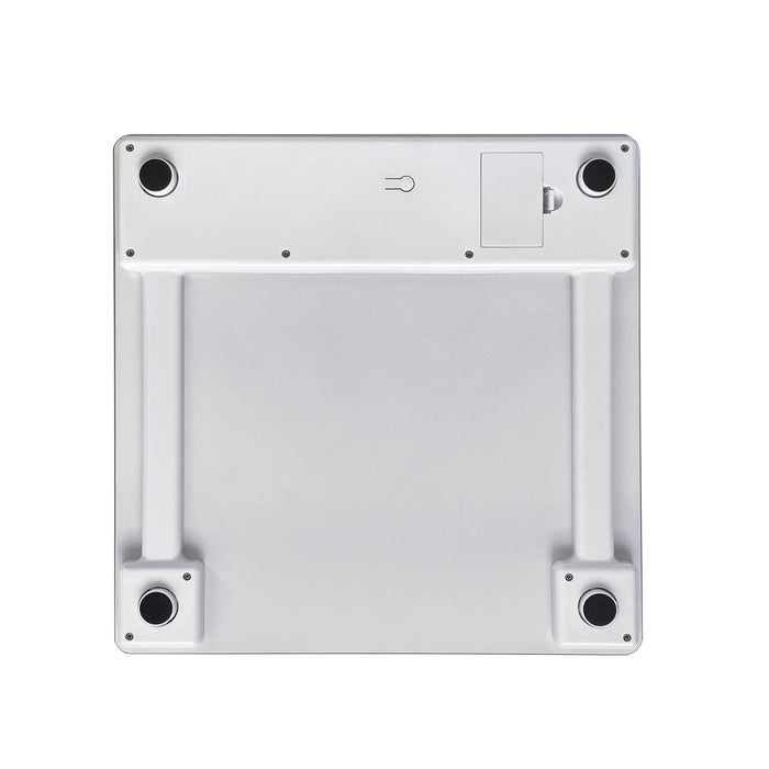 Bottom view of white glass body composition scale showing screws and round feet