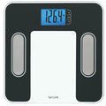Close-up of a black body composition scale with stainless steel accents and a blue backlit display.