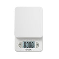 Close up of a white compact digital kitchen scale top with rounded corners