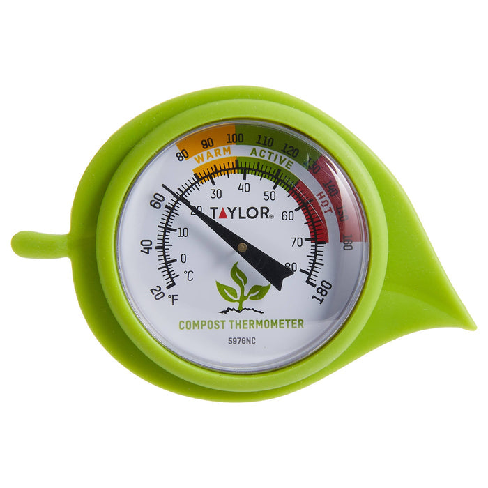 Close up of lime green compost thermometer with leaf guard dial visible and compost symbol