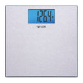 Textured brushed stainless steel digital scale with blue backlit display reading 126.9 lb and Taylor logo