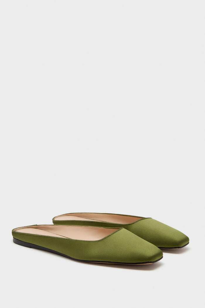 Fern Satin Nilli Flats: Classic, effortless slip-on mules with a pointed toe and flat leather sole, perfect for high-end versatility and fun, everyday wear.