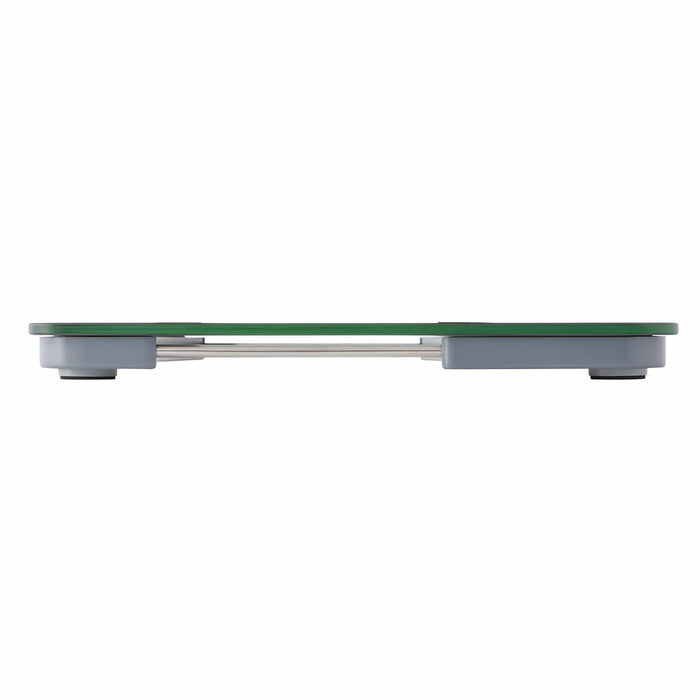 Side profile of a glass body composition scale with a green glass platform and gray base