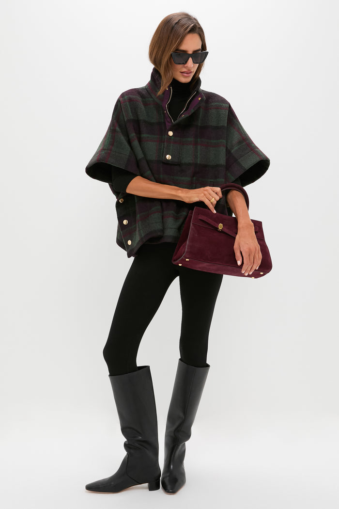 Model showcasing an effortlessly classic ensemble, highlighting a high-end Gold Berry Vine Ring that adds a fun, feminine flourish to the outfit.