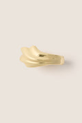 High polish gold Lydia Cuff, a fluid, abstract form exuding classic elegance and effortless style, perfect for fun and high-end fashion statements.