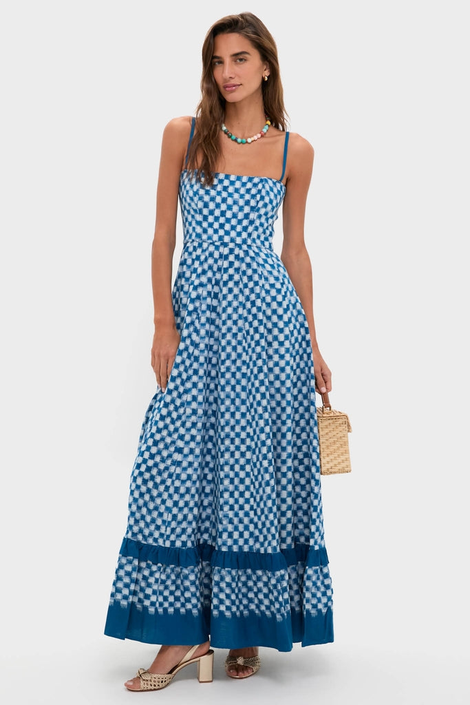 Young woman models an effortlessly chic blue-and-white checkered maxi dress, accessorized with the classic Multi Bright By Nature Necklace for a fun, high-end look.