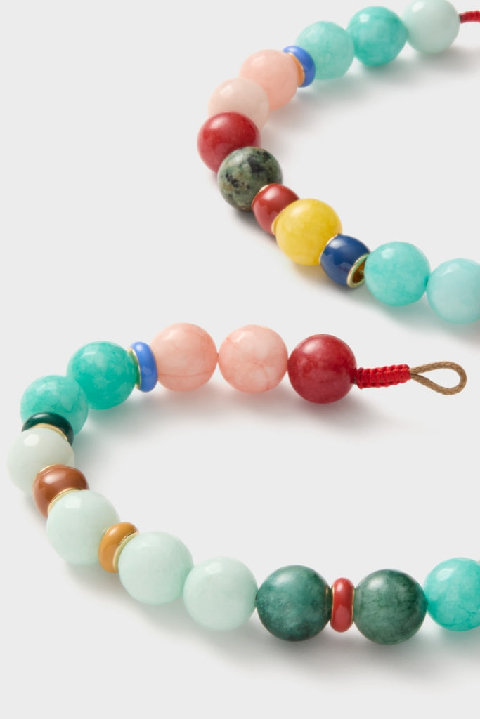 Close-up of the Multi Bright By Nature Necklace, featuring classic, vibrant semi-precious beads with enamel rondelles, offering an effortless, fun, high-end accessory with a button closure.