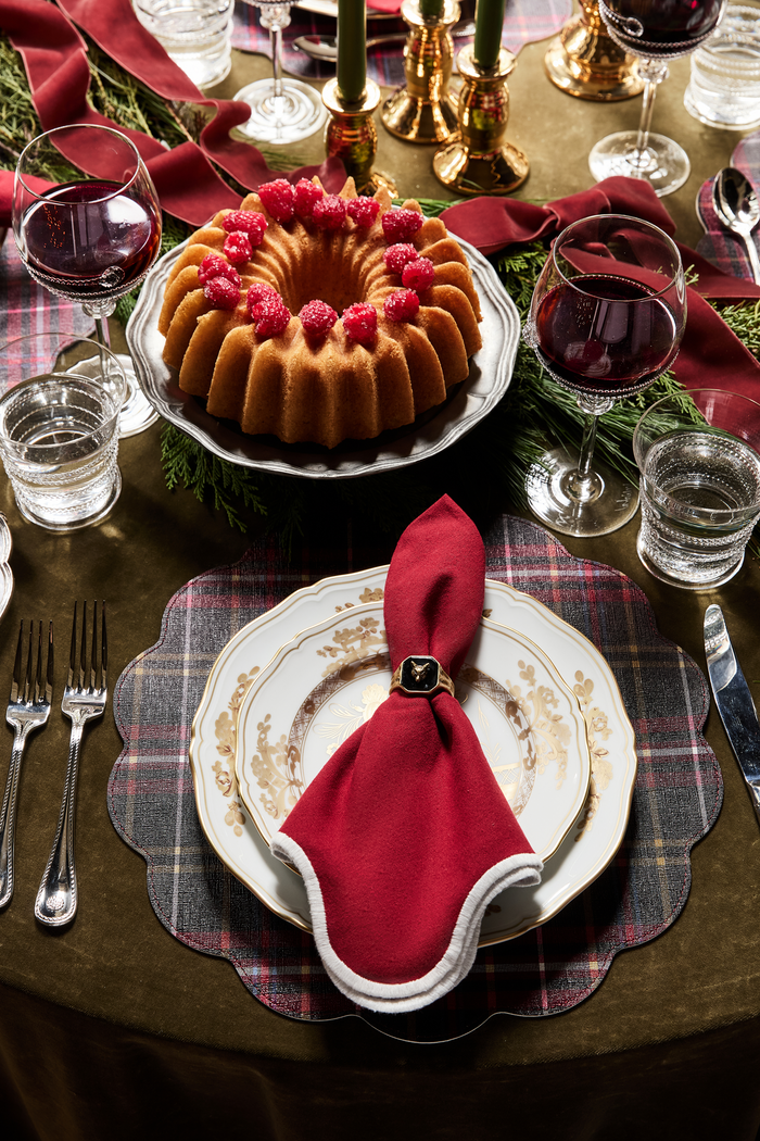 Classic holiday table with an Oriente Italiano Aurum Salad Plate, featuring a gold-trimmed edge and stylized flower, complemented by elegant décor for an effortless, high-end dining experience.