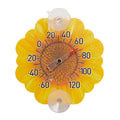 Yellow sunflower shaped thermometer with suction cups and a 0 to 120 temperature scale.