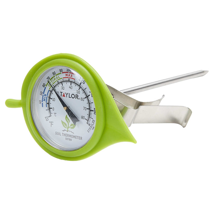 Soil thermometer with decorative leaf guard in a bright green housing close-up