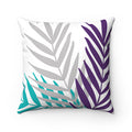 A square-shaped throw pillow with a palm leaves design featuring teal, purple, and gray colors against a white background.
