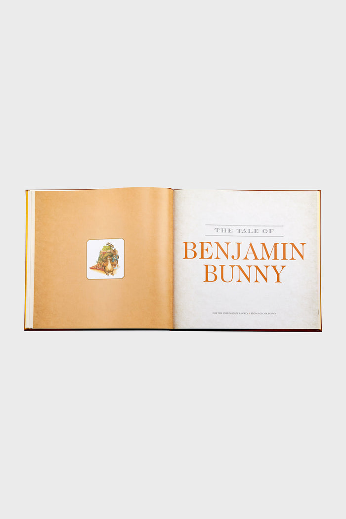 Children's storybook open to THE TALE OF BENJAMIN BUNNY title, featuring classic, effortless fun and high-end storytelling with original art.