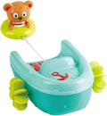 Toy boat with a bear character on a white background