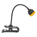 Black gooseneck LED rechargeable clamp-on work lamp with yellow base for tire repair process